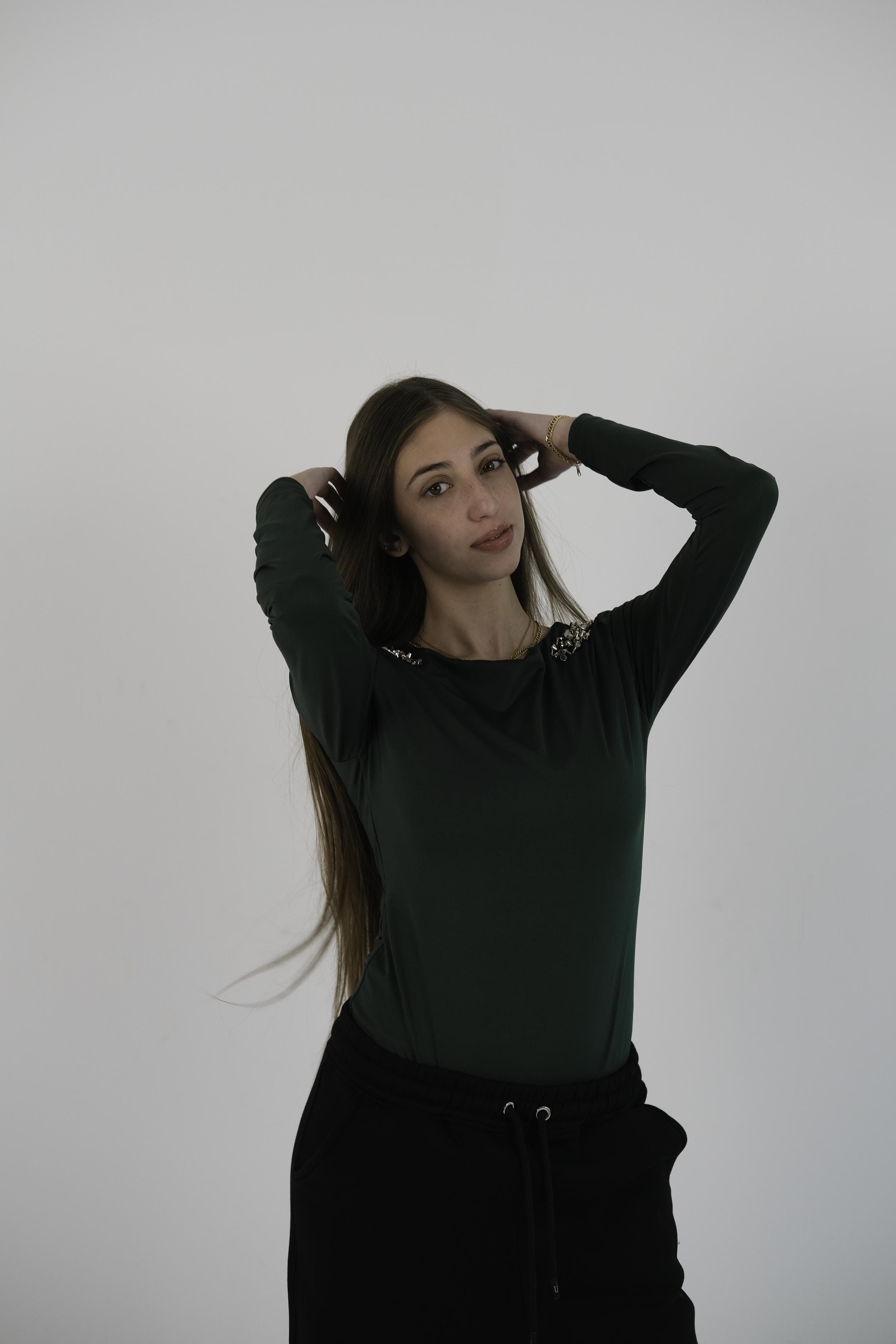 Bodysuit with studs and sleeves